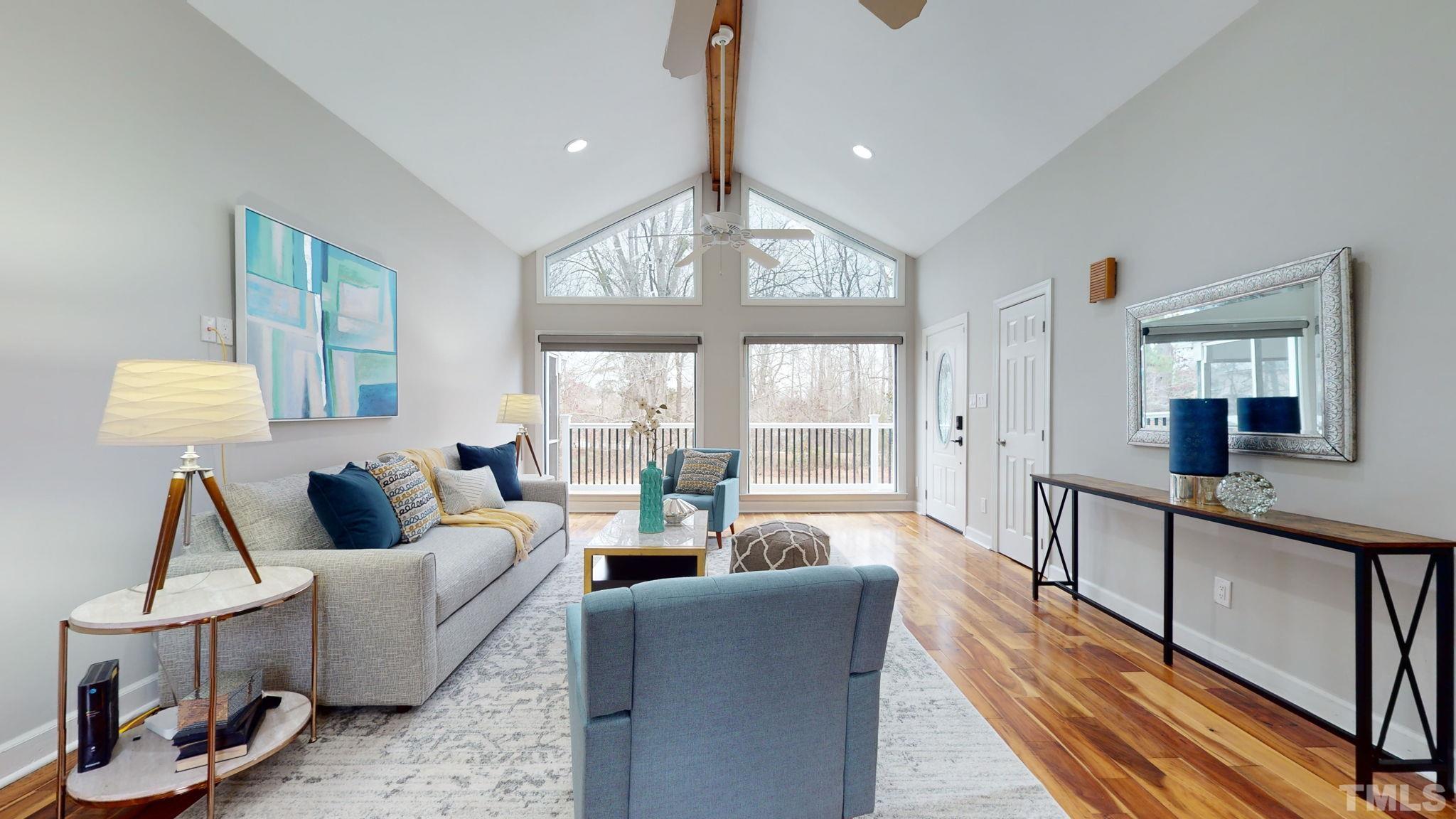 1613 Jenks Carpenter Road Cary, NC 27519 - Photo 26 of 60 a living room with furniture and a large window