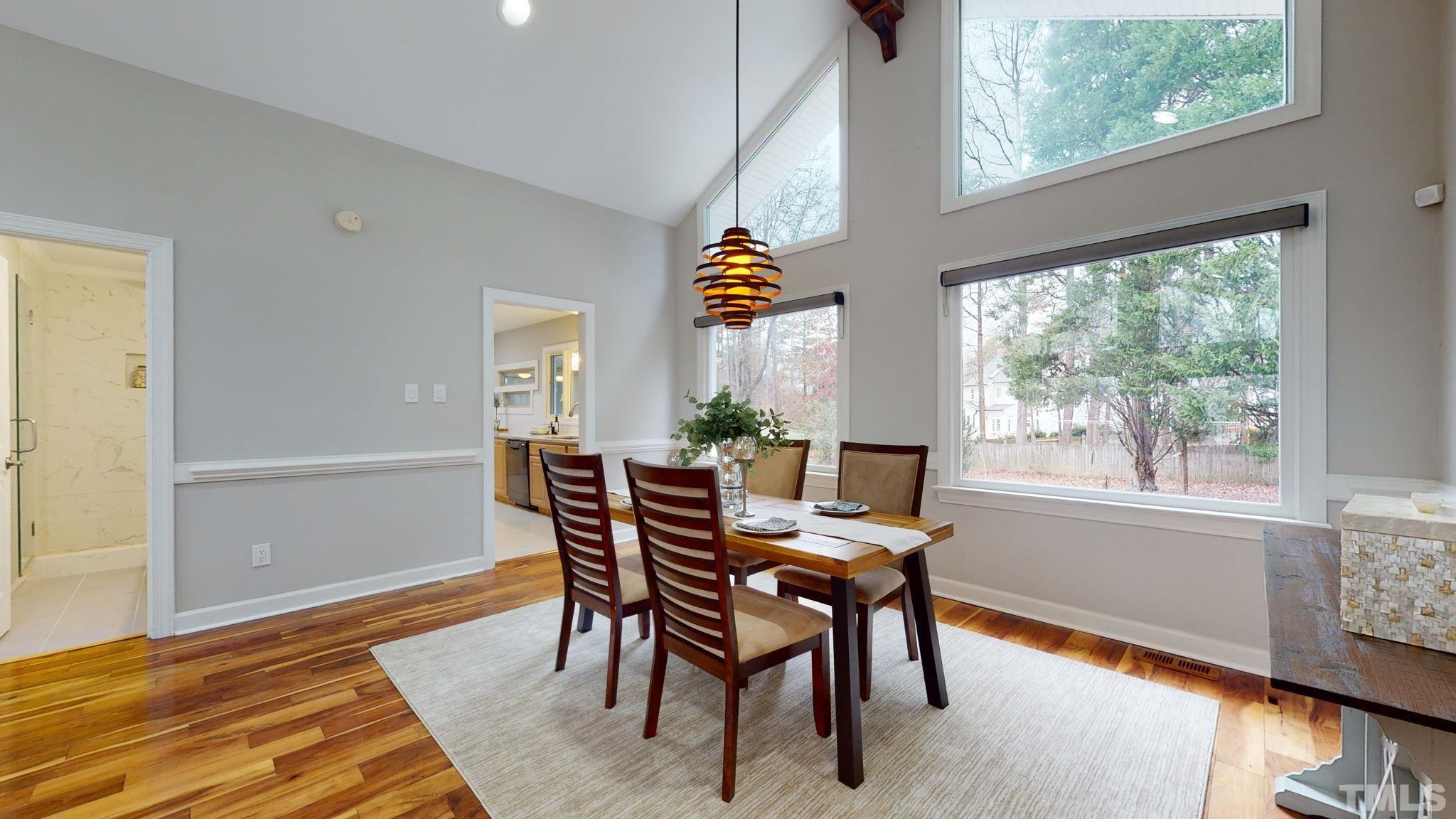 1613 Jenks Carpenter Road Cary, NC 27519 - Photo 28 of 60 a dining room with furniture and window
