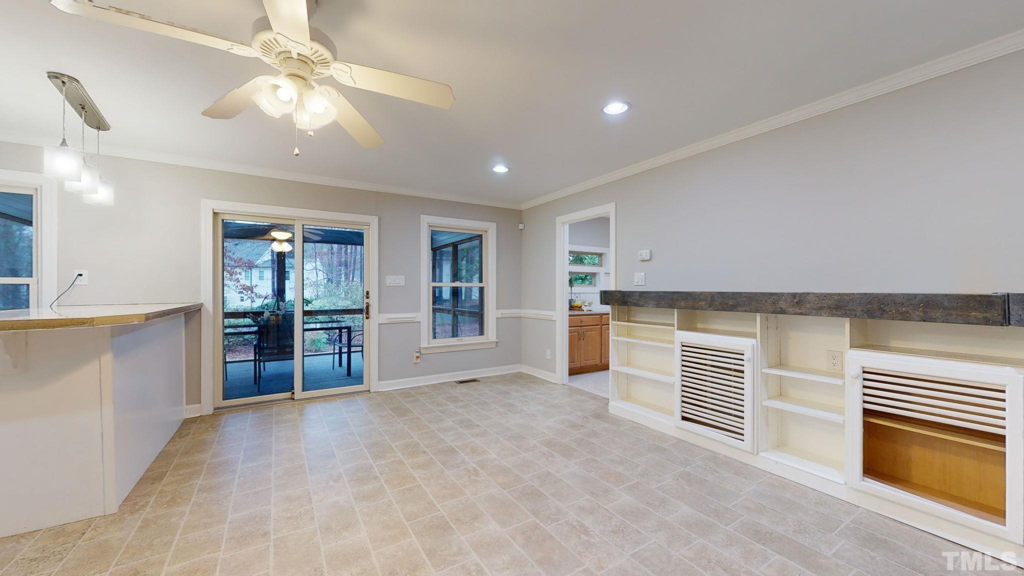 1613 Jenks Carpenter Road Cary, NC 27519 - Photo 35 of 60 a view of a kitchen with furniture and a kitchen