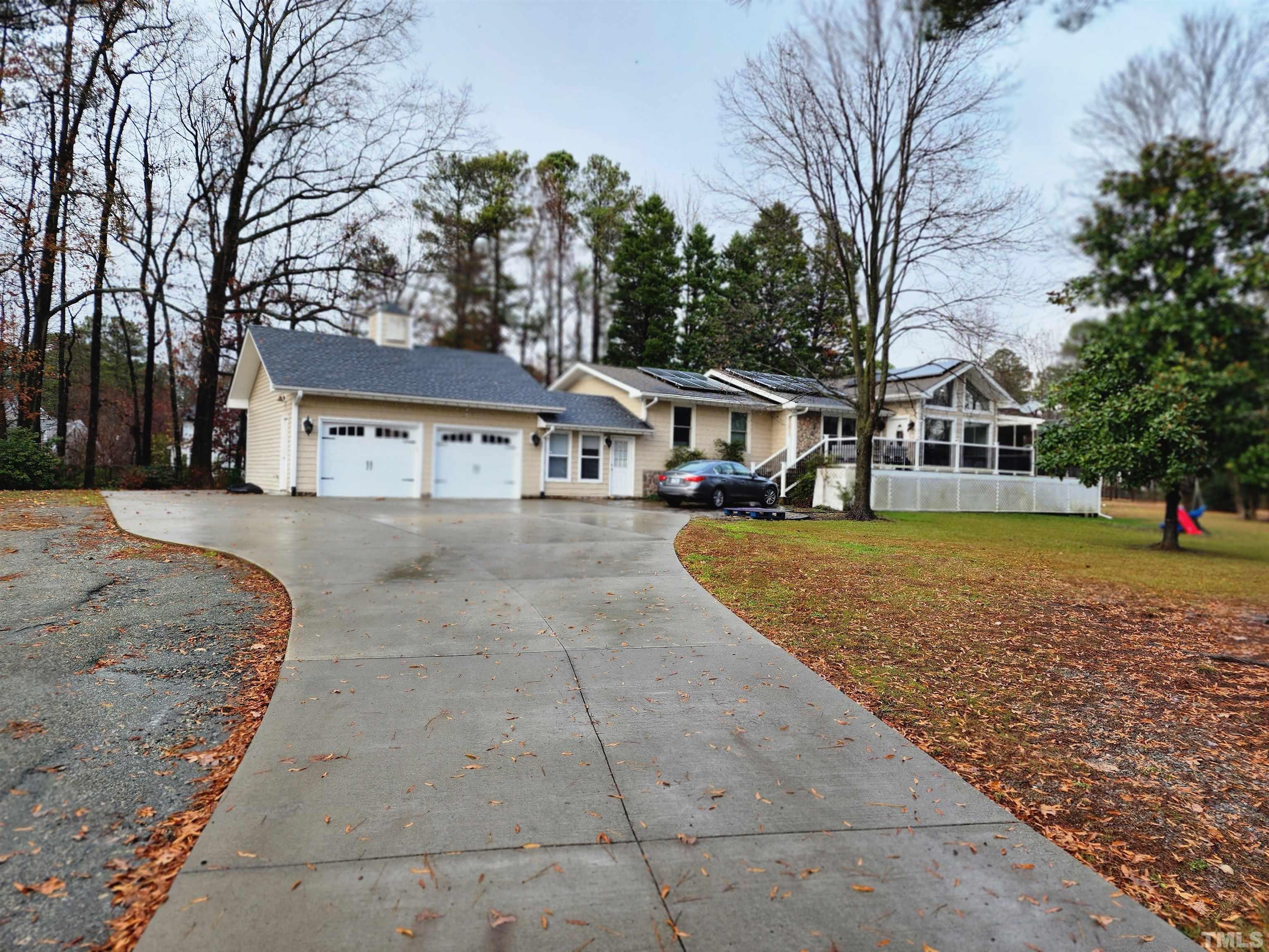 1613 Jenks Carpenter Road Cary, NC 27519 - Photo 4 of 60 a view of house with outdoor space