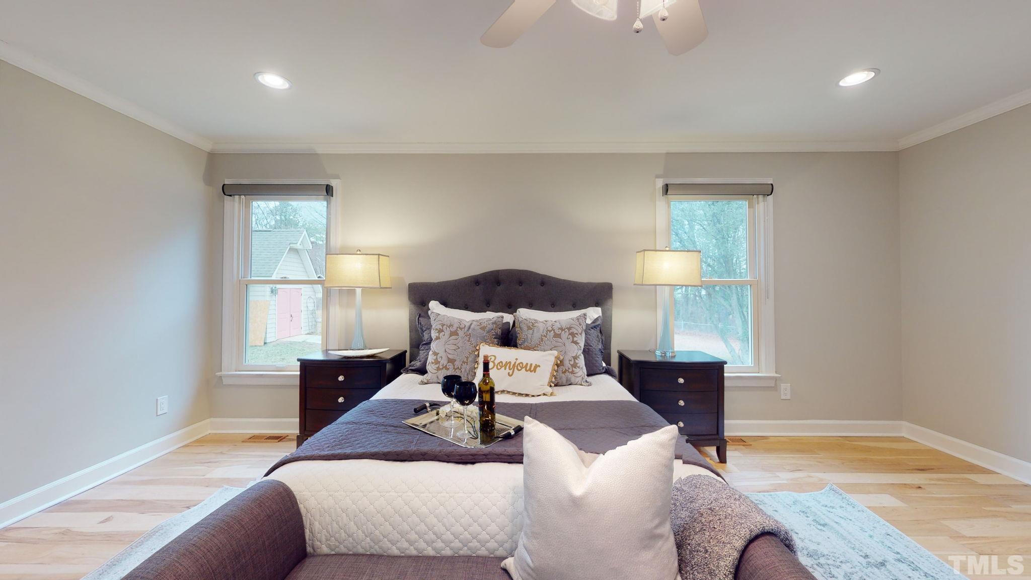 1613 Jenks Carpenter Road Cary, NC 27519 - Photo 49 of 60 a bed room with a bed and a window