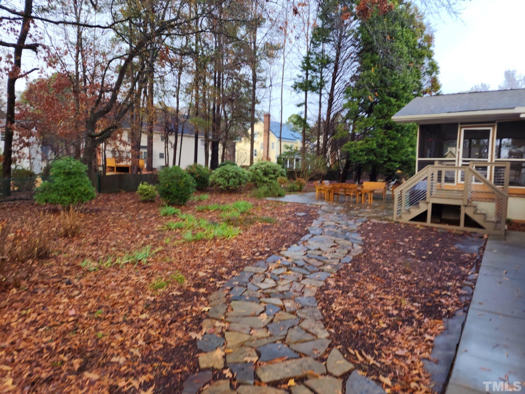1613 Jenks Carpenter Road Cary, NC 27519 - Photo 10 of 60 a front view of a house with garden