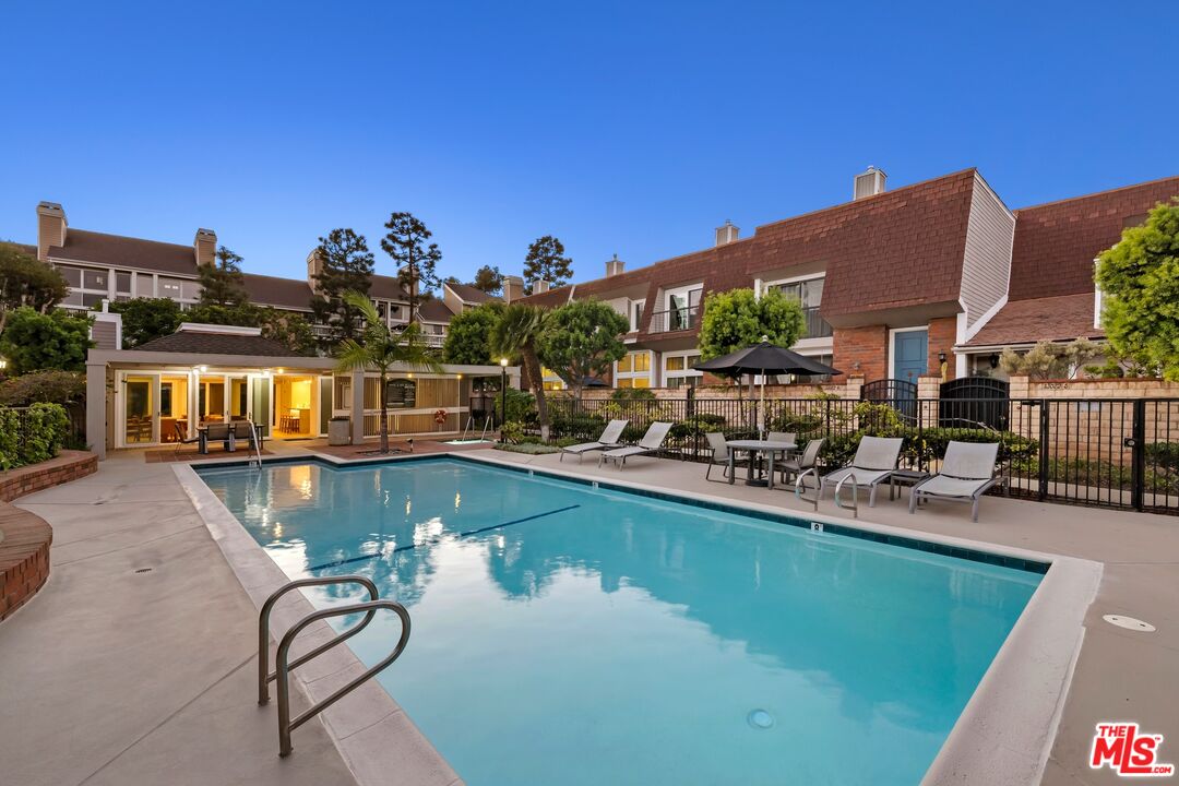 13010 Maxella Avenue, Unit 5 Marina del Rey, CA 90292 - Photo 31 of 32 a view of a house with swimming pool yard and furniture