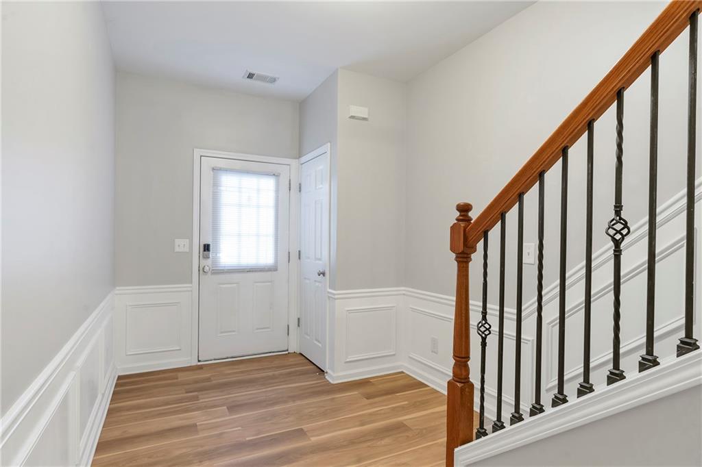1653 Fair Oak Way Mableton, GA 30126 - Photo 12 of 30 a view of an entryway with wooden floor