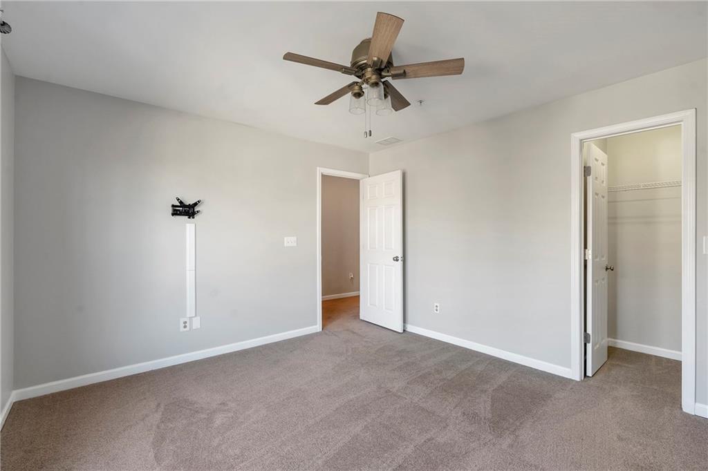 1653 Fair Oak Way Mableton, GA 30126 - Photo 21 of 30 a view of a livingroom with a ceiling fan