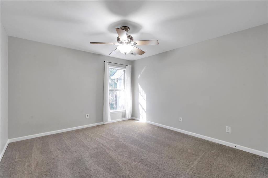 1653 Fair Oak Way Mableton, GA 30126 - Photo 23 of 30 a view of an empty room with a window