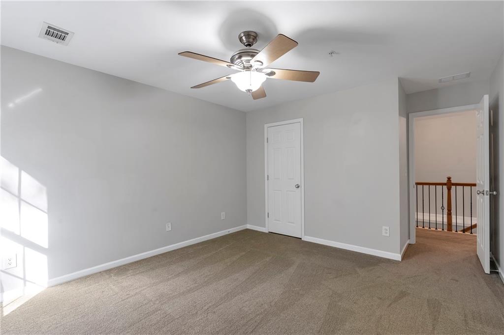 1653 Fair Oak Way Mableton, GA 30126 - Photo 24 of 30 a view of a chandelier fan and entryway