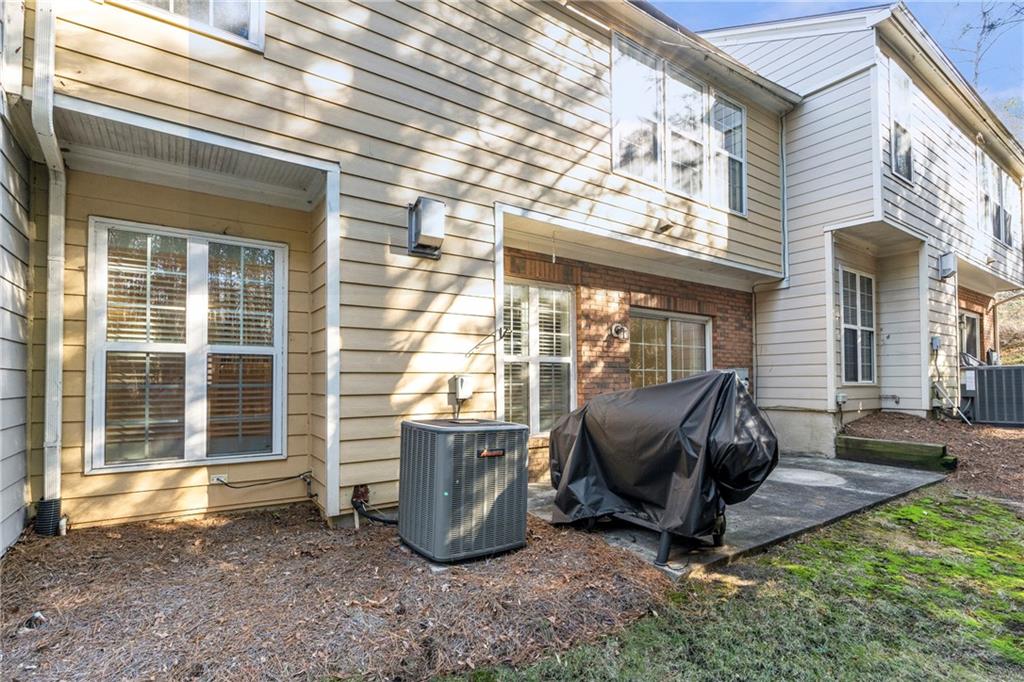1653 Fair Oak Way Mableton, GA 30126 - Photo 28 of 30 a view of a two chair in the patio