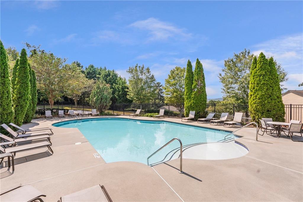 1653 Fair Oak Way Mableton, GA 30126 - Photo 30 of 30 a view of a swimming pool with a lounge chair