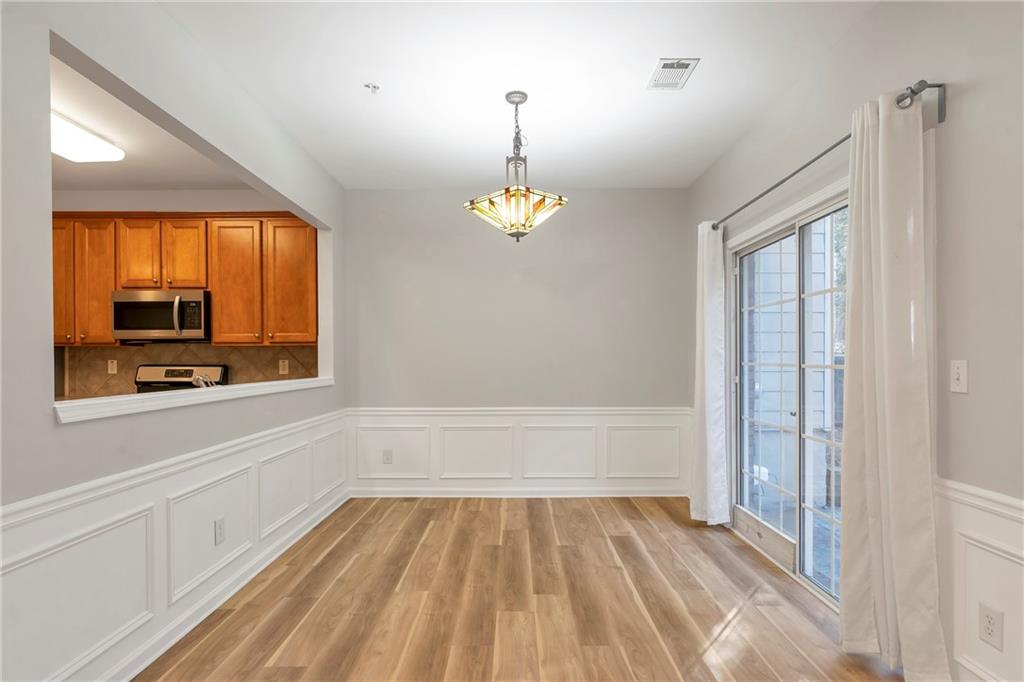 1653 Fair Oak Way Mableton, GA 30126 - Photo 4 of 30 a bathroom with a bathtub and a shower