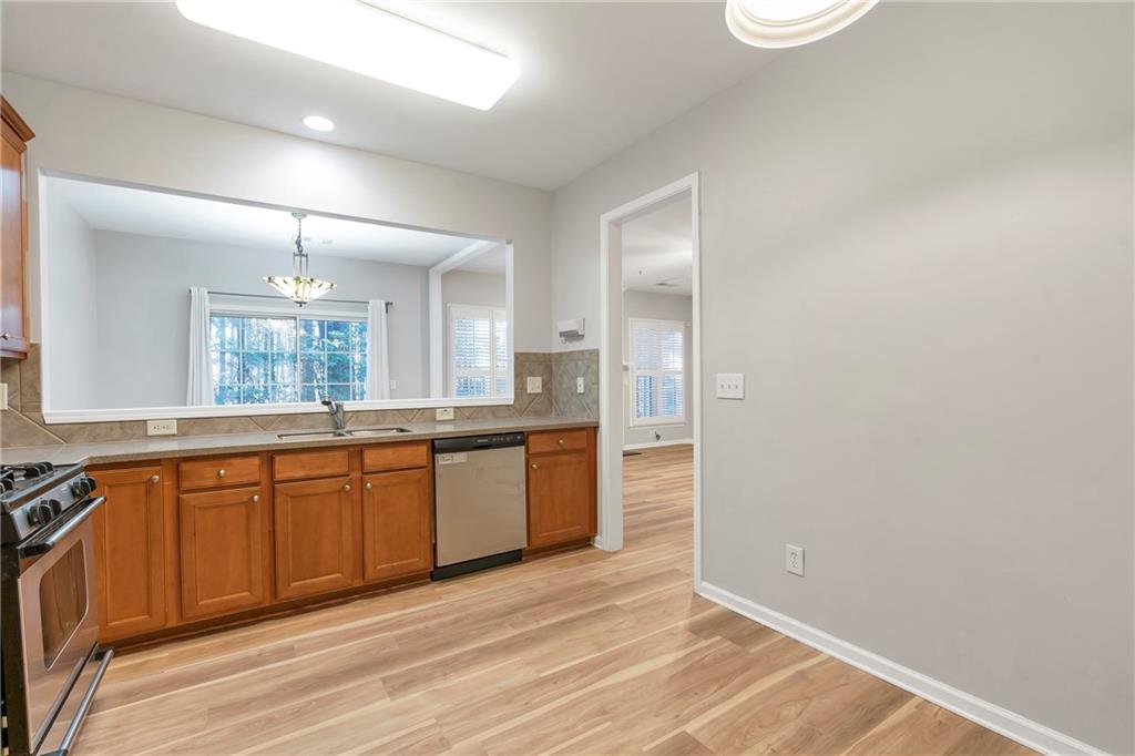 1653 Fair Oak Way Mableton, GA 30126 - Photo 10 of 30 a large bathroom with a sink mirror and a window