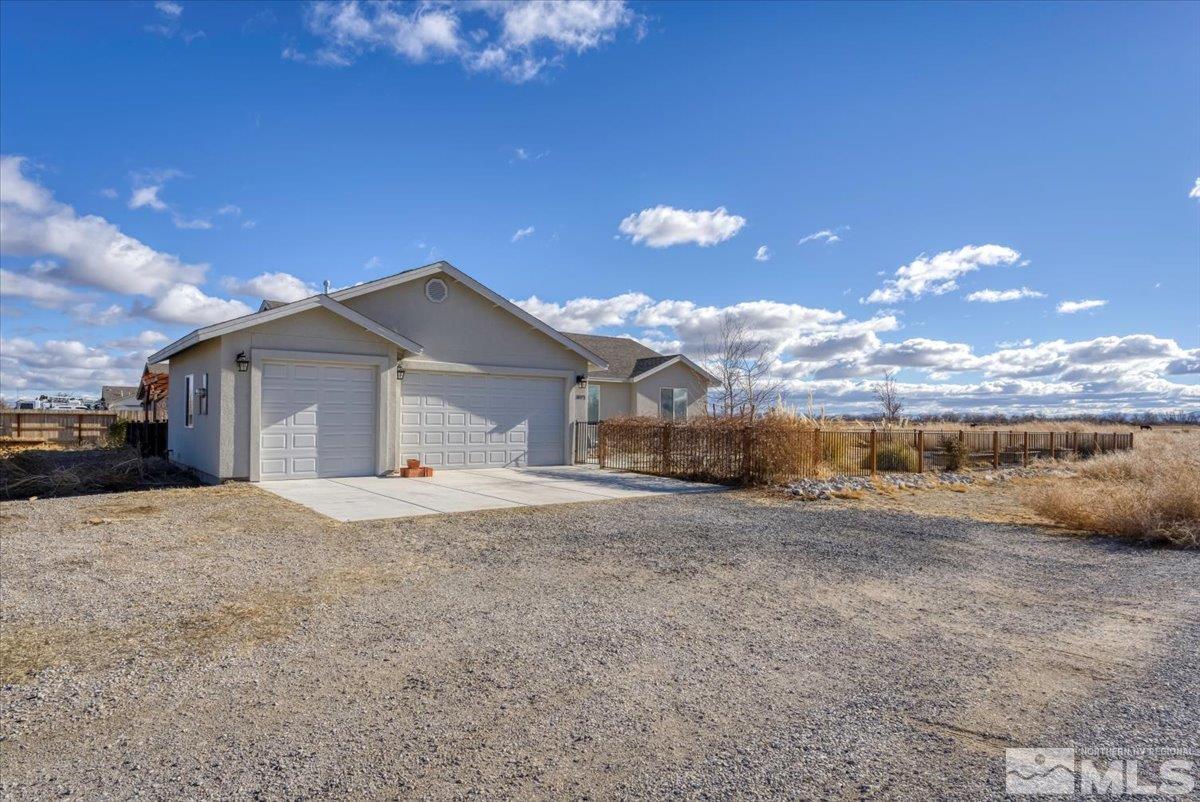 3071 Schindler Road Fallon, NV 89406 - Photo 23 of 40 a view of a house with a yard
