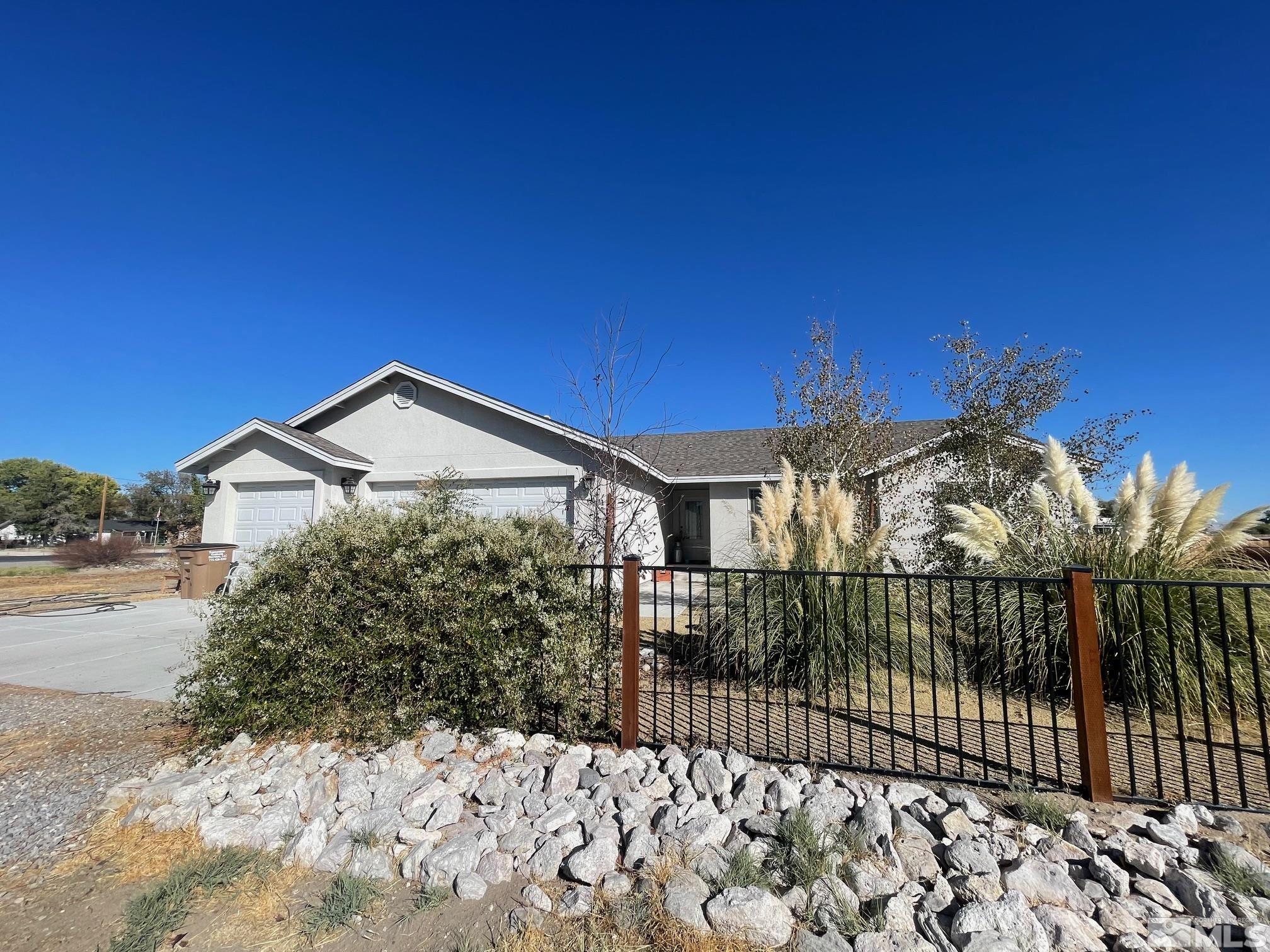 3071 Schindler Road Fallon, NV 89406 - Photo 3 of 40 a view of a house with a snow in the background