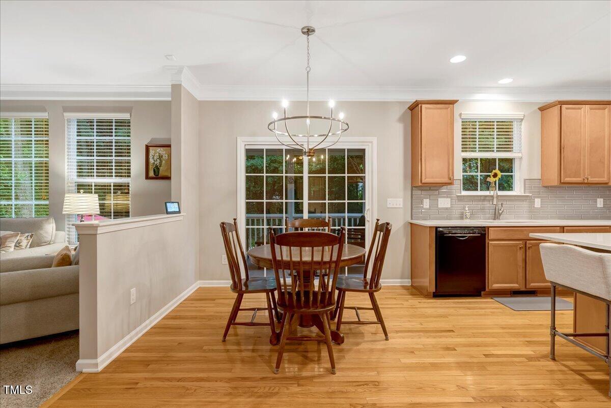 201 Forbes Road Wake Forest, NC 27587 - Photo 18 of 42 a view of a dining room with furniture window and outside view