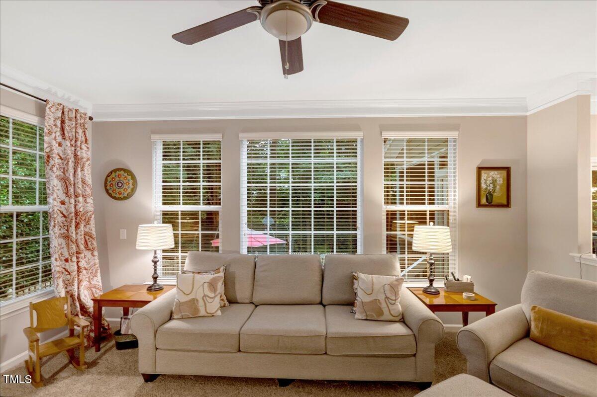 201 Forbes Road Wake Forest, NC 27587 - Photo 26 of 42 a living room with furniture and windows