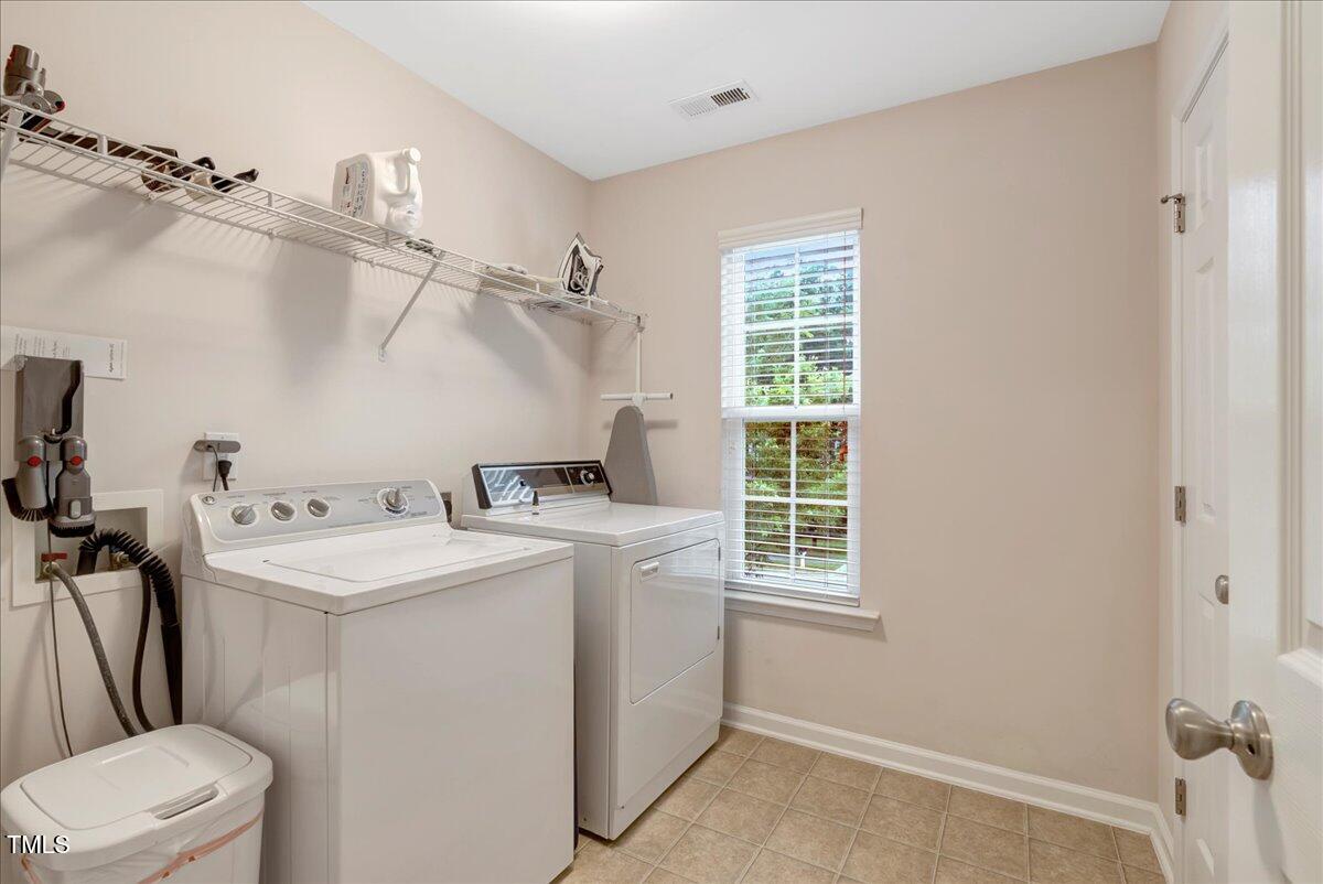 201 Forbes Road Wake Forest, NC 27587 - Photo 28 of 42 a utility room with dryer and washer