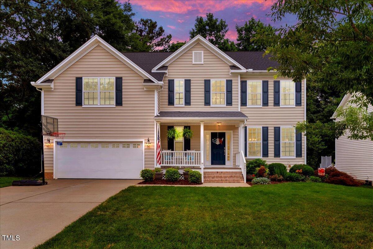 201 Forbes Road Wake Forest, NC 27587 - Photo 2 of 42 a front view of a house with a yard