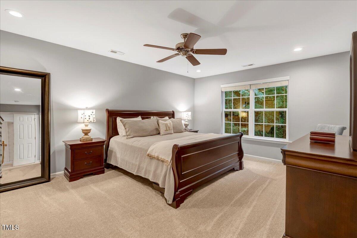 201 Forbes Road Wake Forest, NC 27587 - Photo 31 of 42 a bedroom with a bed and window