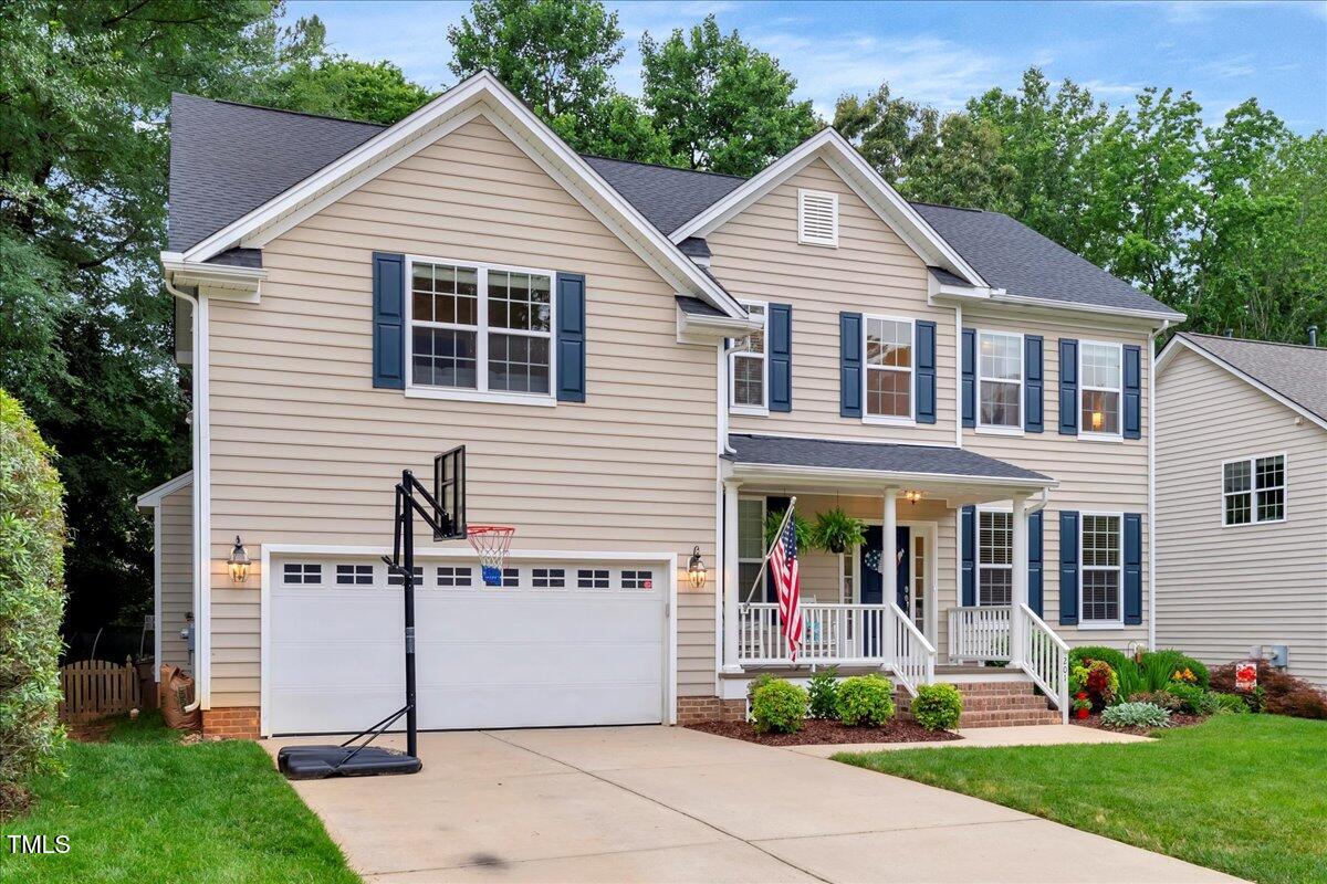 201 Forbes Road Wake Forest, NC 27587 - Photo 3 of 42 a front view of a house with garden