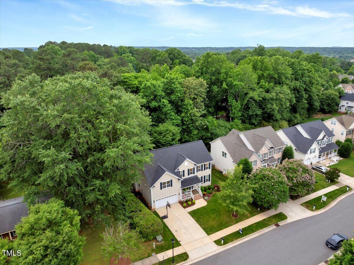 201 Forbes Road Wake Forest, NC 27587 - Photo 40 of 42 an aerial view of a house with garden space and street view
