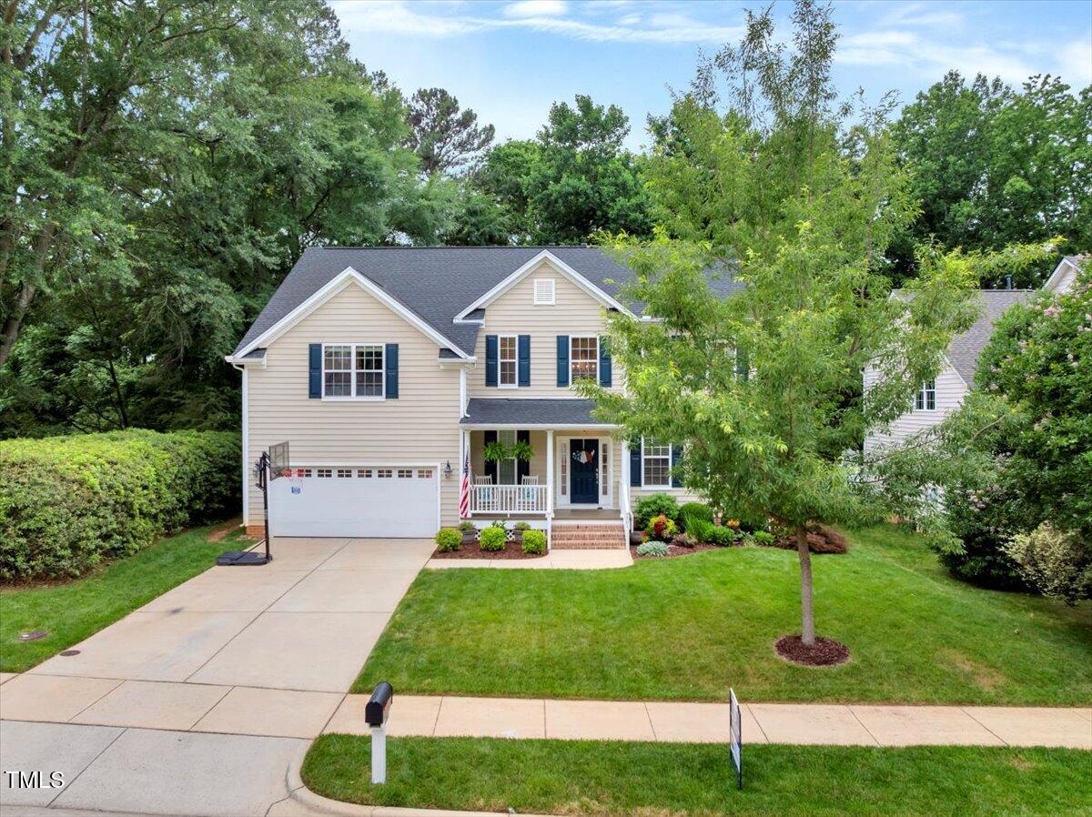 201 Forbes Road Wake Forest, NC 27587 - Photo 5 of 42 a front view of a house with garden