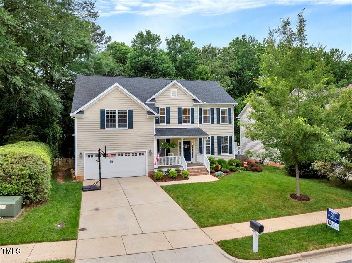 201 Forbes Road Wake Forest, NC 27587 - Photo 6 of 42 a front view of a house with a yard