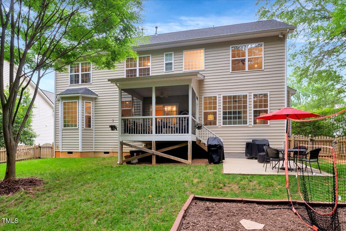 201 Forbes Road Wake Forest, NC 27587 - Photo 9 of 42 a view of a house with a backyard