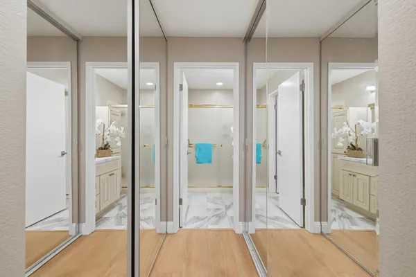 a bathroom with a tub and shower