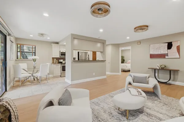 a living room with furniture and a table