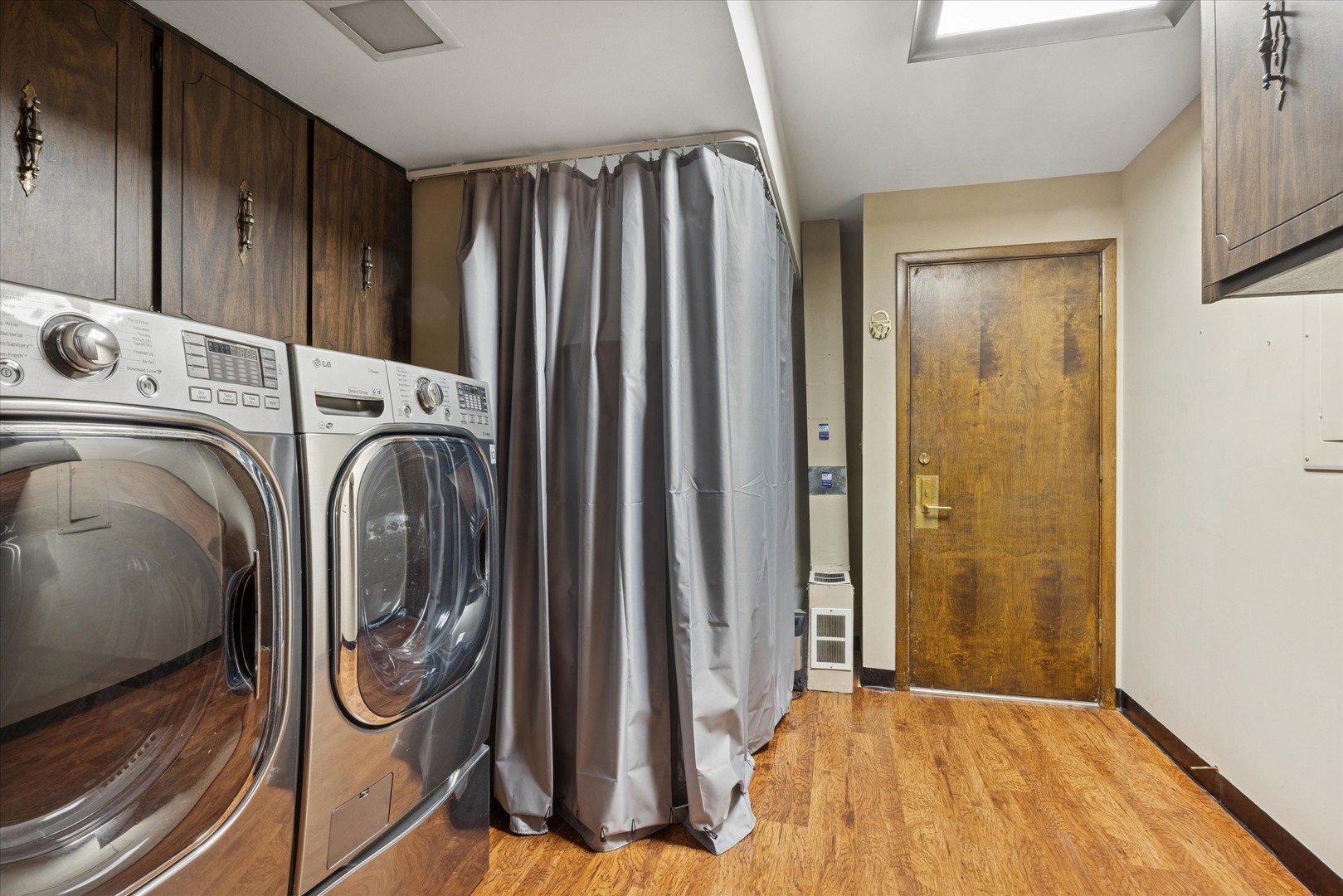 7990 Garfield Avenue, Unit 143 Burr Ridge, IL 60527 - Photo 11 of 16 a view of walk in closet with wooden floor