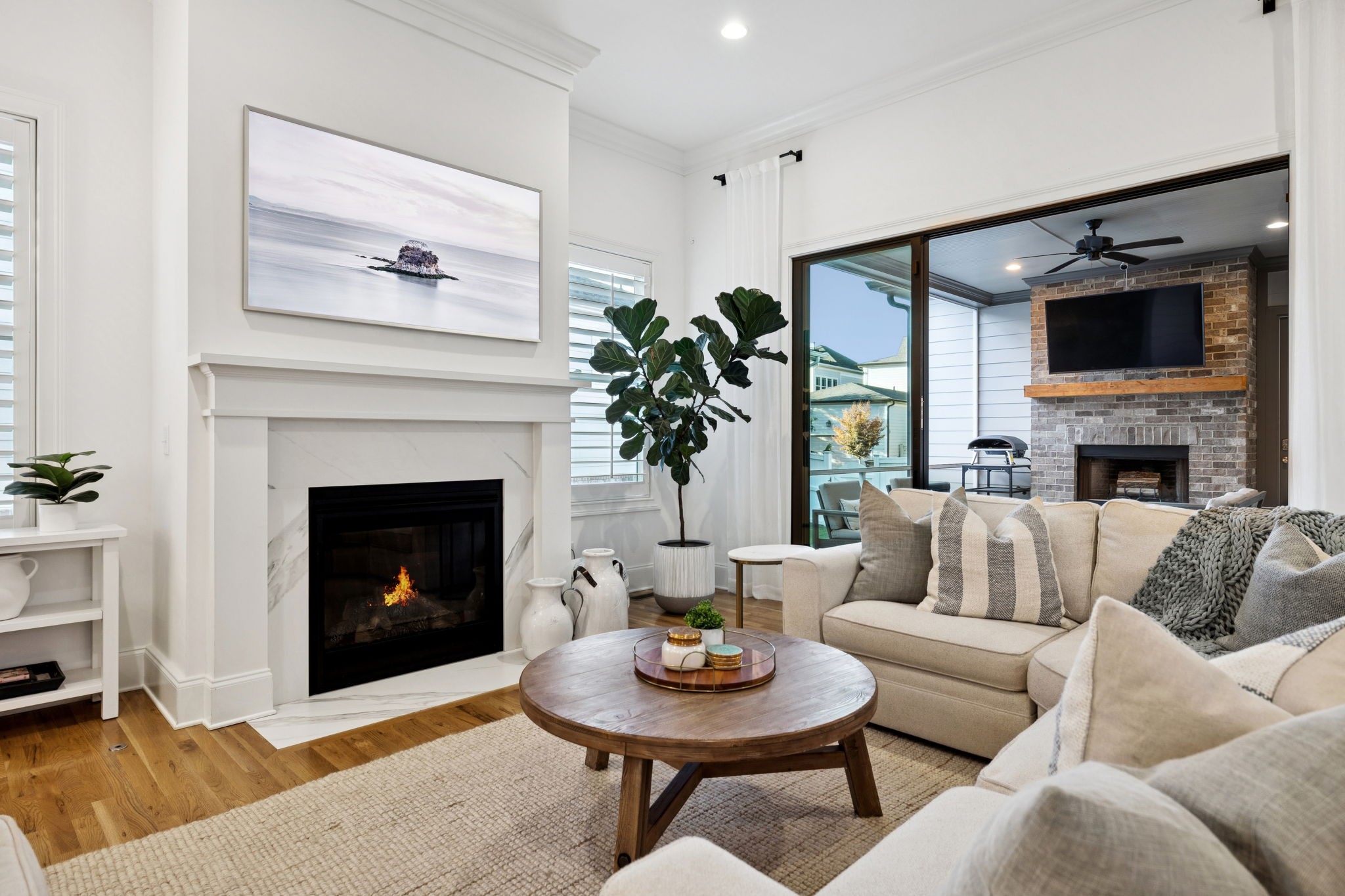 3091 Conar Street Franklin, TN 37064 - Photo 31 of 79 a living room with furniture a fireplace and a flat screen tv