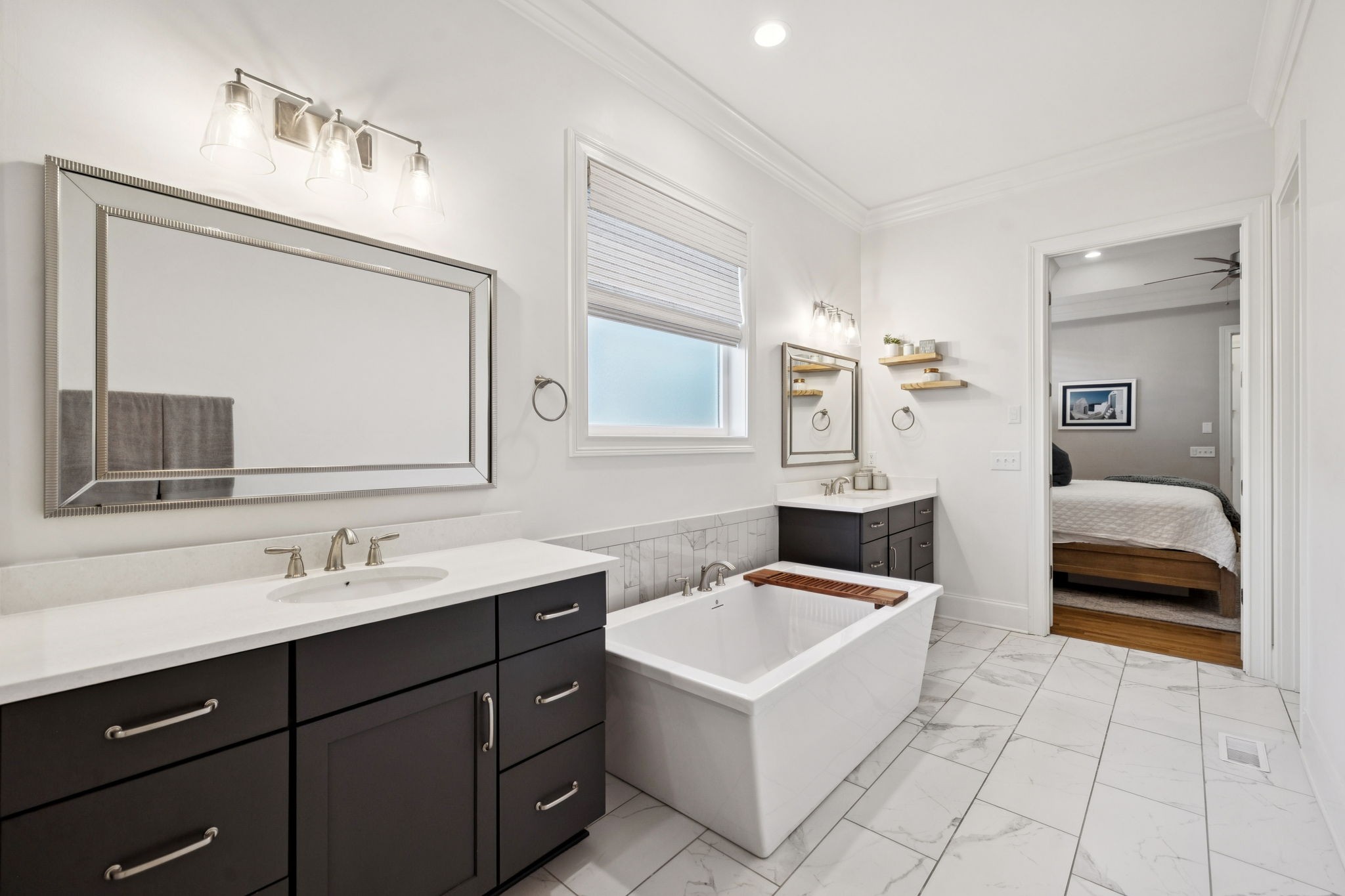 3091 Conar Street Franklin, TN 37064 - Photo 42 of 79 a en suite bathroom with a double vanity sink a mirror and a bathtub