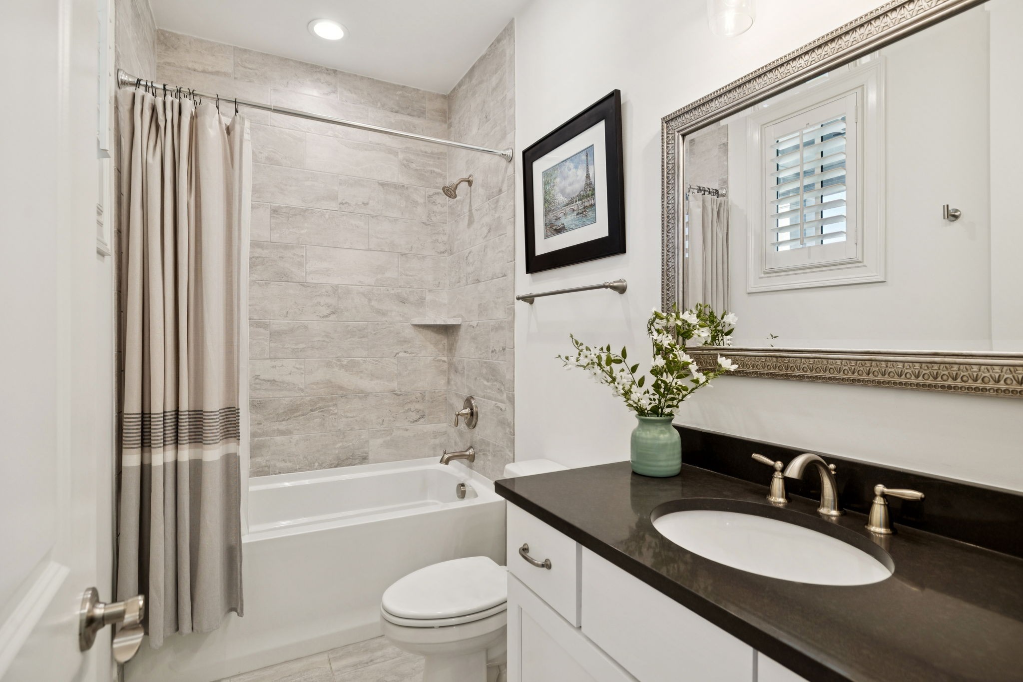 3091 Conar Street Franklin, TN 37064 - Photo 47 of 79 a bathroom with a granite countertop sink toilet a mirror a vanity and shower