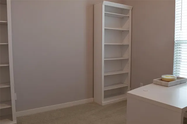 a view of bathroom and closet