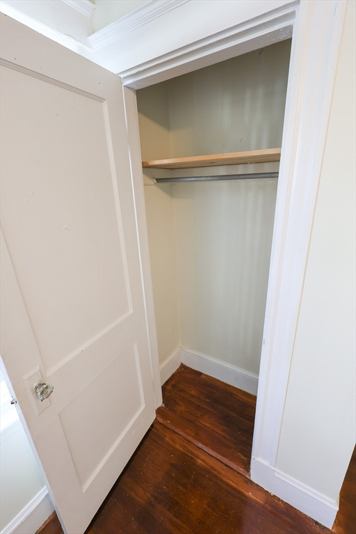 144 Blake Street, Unit 2 Boston, MA 02136 - Photo 19 of 28 a view of walk in closet with wooden floor