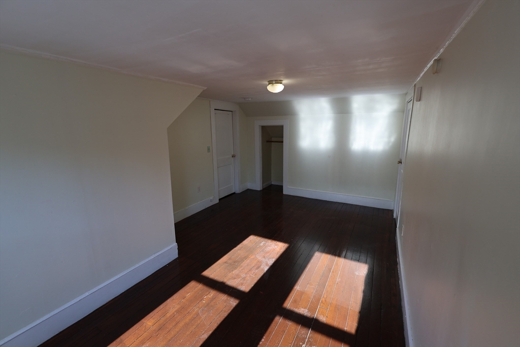 144 Blake Street, Unit 2 Boston, MA 02136 - Photo 26 of 28 a view of wooden floor