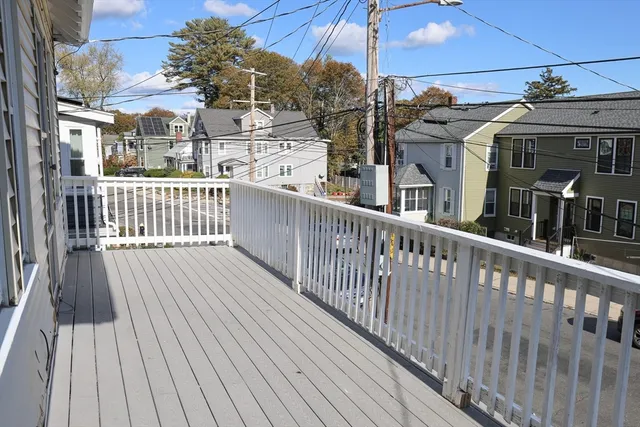 a view of a houses with a street