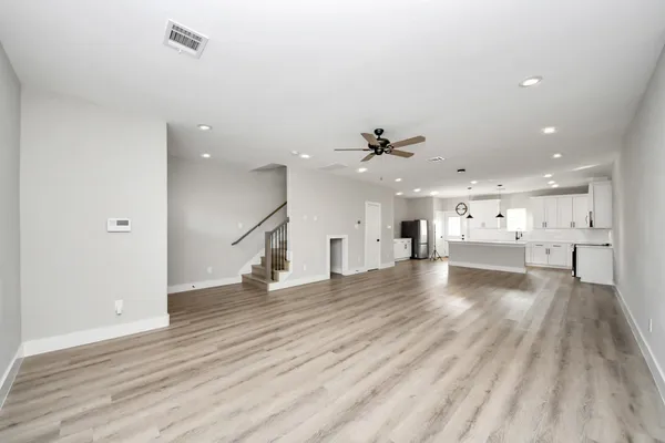 a view of a kitchen with a sink and a window