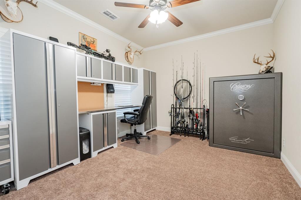 2687 McClendon Road Weatherford, TX 76088 - Photo 22 of 40 a view of a room with gym equipment