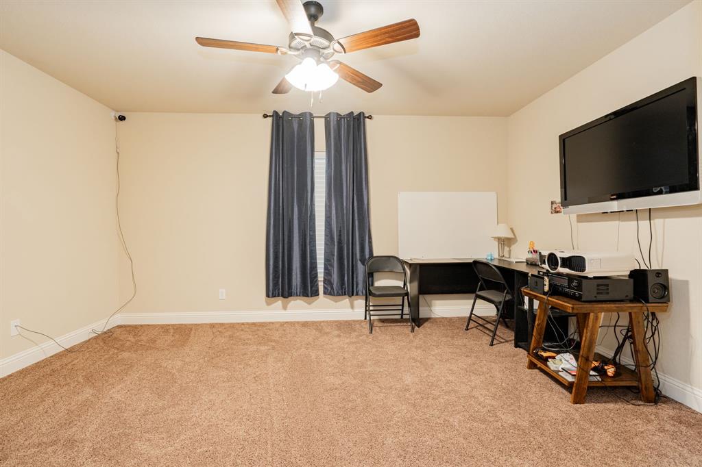 2687 McClendon Road Weatherford, TX 76088 - Photo 30 of 40 a view of room with workspace and a window