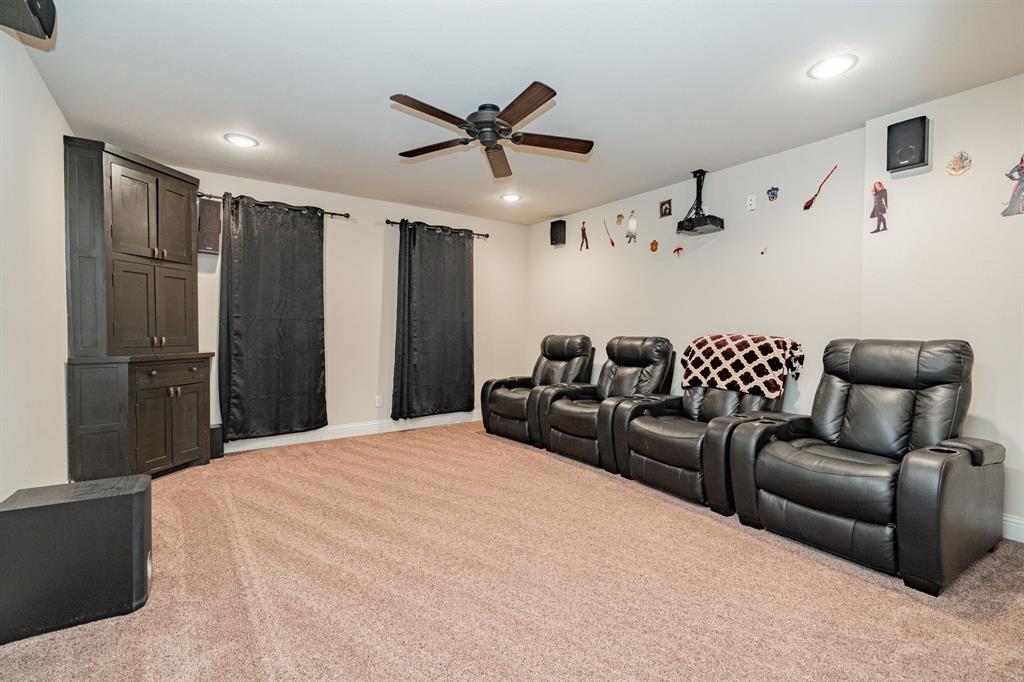2687 McClendon Road Weatherford, TX 76088 - Photo 32 of 40 a bed room with a bed and furniture