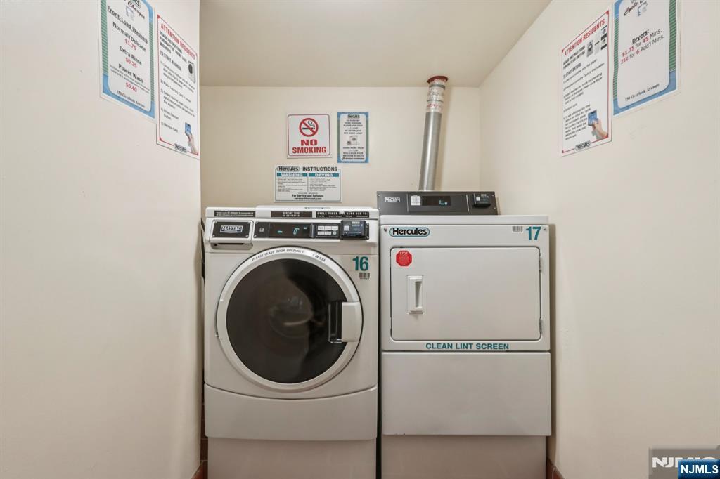 150 Overlook Avenue, Unit 7F Hackensack, NJ 07601 - Photo 20 of 24 a utility room with dryer and washer
