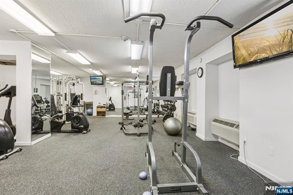 150 Overlook Avenue, Unit 7F Hackensack, NJ 07601 - Photo 21 of 24 a view of a room with gym equipment