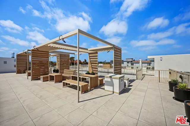 a view of a terrace with chairs