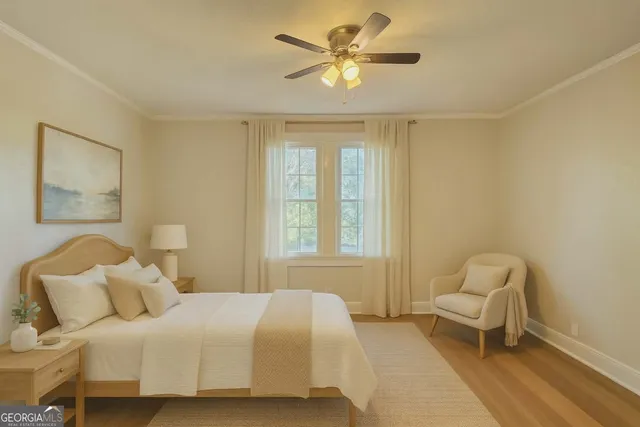 a bedroom with a bed and chair