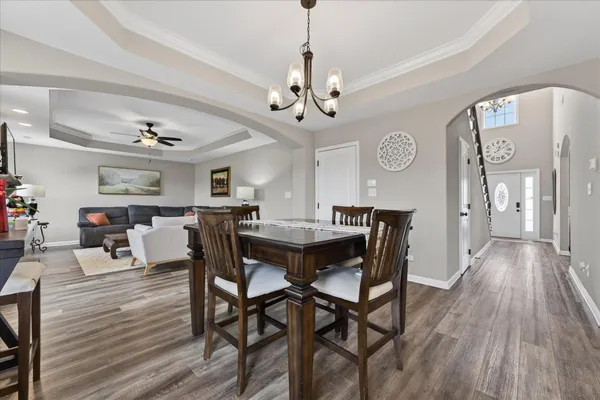 a kitchen with stainless steel appliances a refrigerator sink and microwave