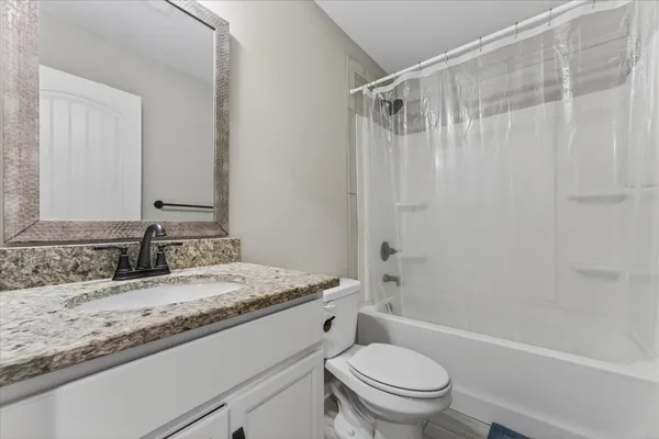 a close view of water heater and storage in a room