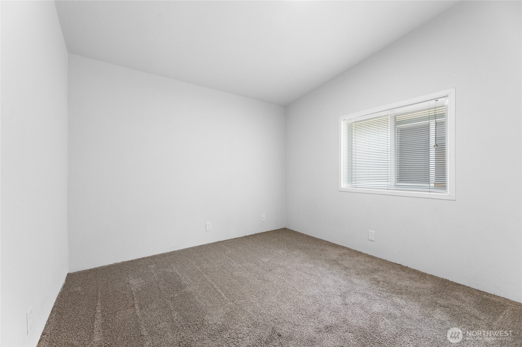 16037 Vail Loop Road Southeast Rainier, WA 98576 - Photo 16 of 32 a view of an empty room with a window