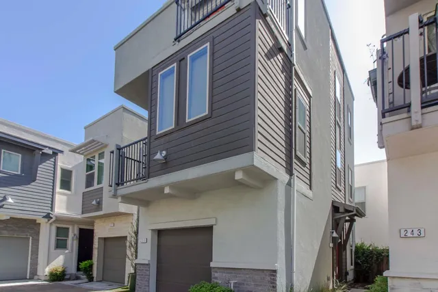 a view of a house with a street