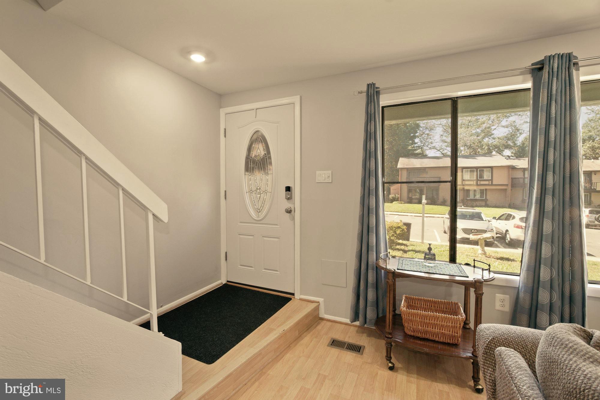 9122 Centerway Road Gaithersburg, MD 20879 - Photo 11 of 33 a view of livingroom with furniture and windows